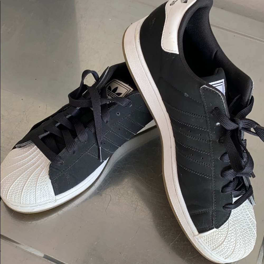 Addis’s Shell Toe sneakers